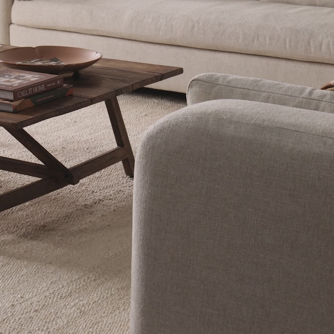 Video of Four Hands Elio Coffee Table Small in Burnt Bleached Oak in a neutral living room at Addison West