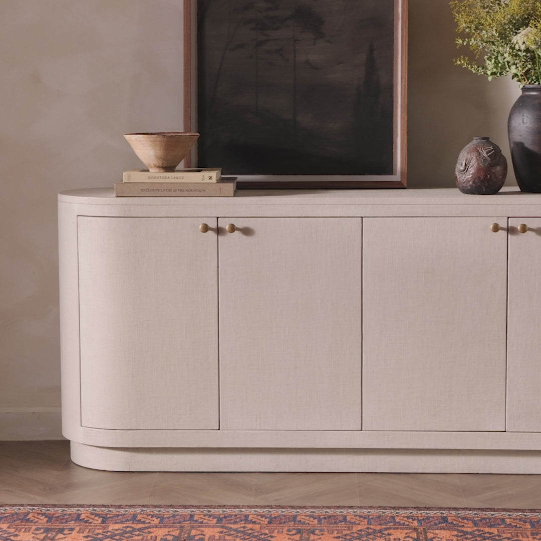 Video of Four Hands Amelia Sideboard in Ivory Painted Linen against a beige wall at Addison West