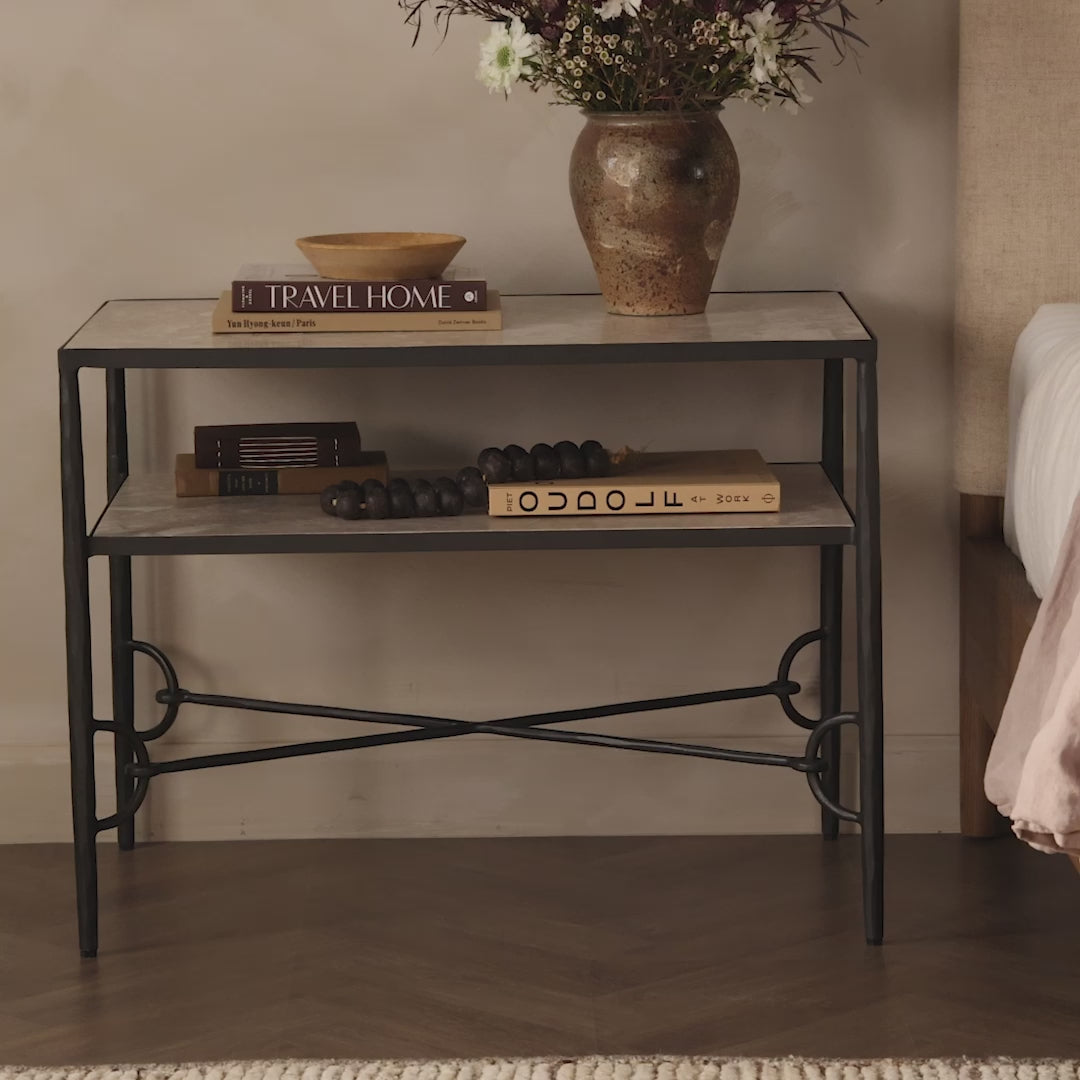 Video of Four Hands Babylon Nightstand in Hammered Gunmetal against a bege wall at Addison West
