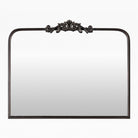 Aarlen Mantel Mirror in Antiqued Black on a white background at Addison West