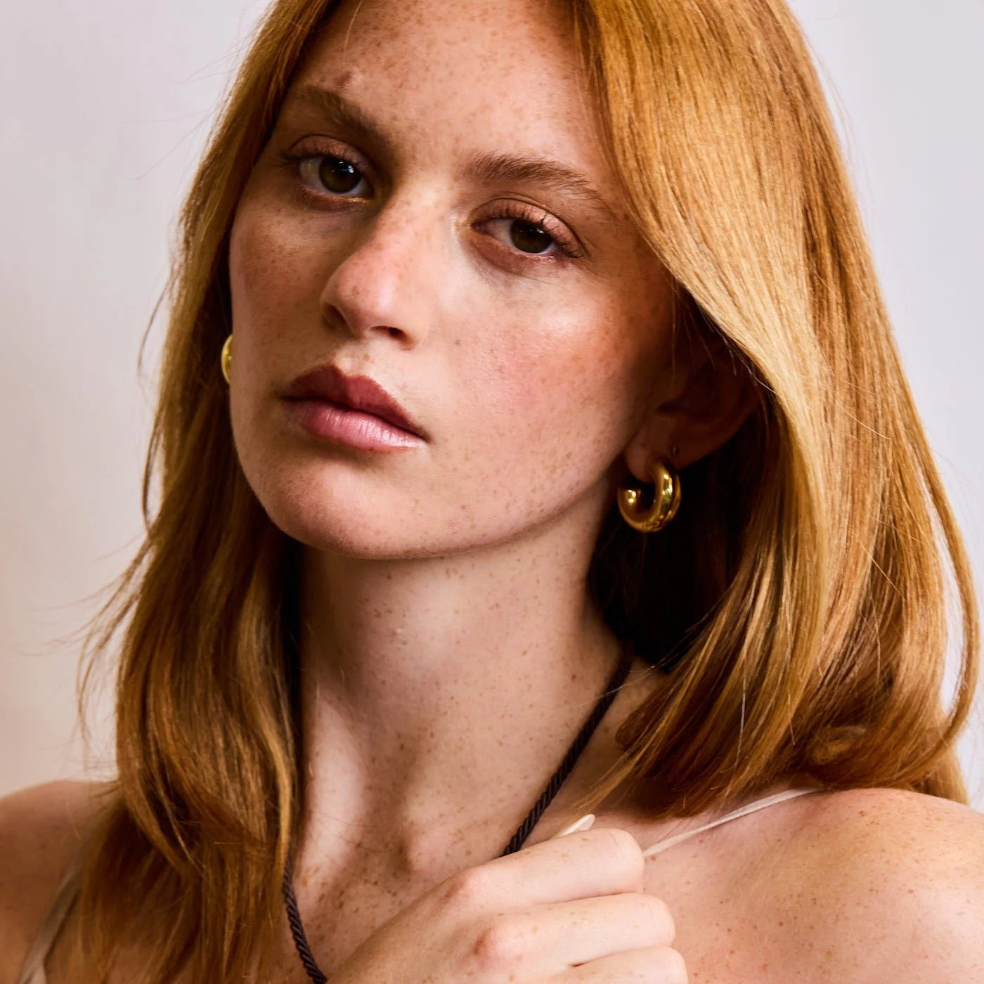 Elli Parr Small Chunky Hoop on a model at Addison West