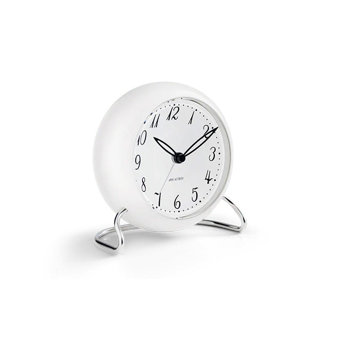 Arne Jacobsen LK Table Clock in White on a white background at Addison West
