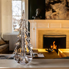 Vermont Evergreen Glass Tree, 14" in front of a fire at Addison West