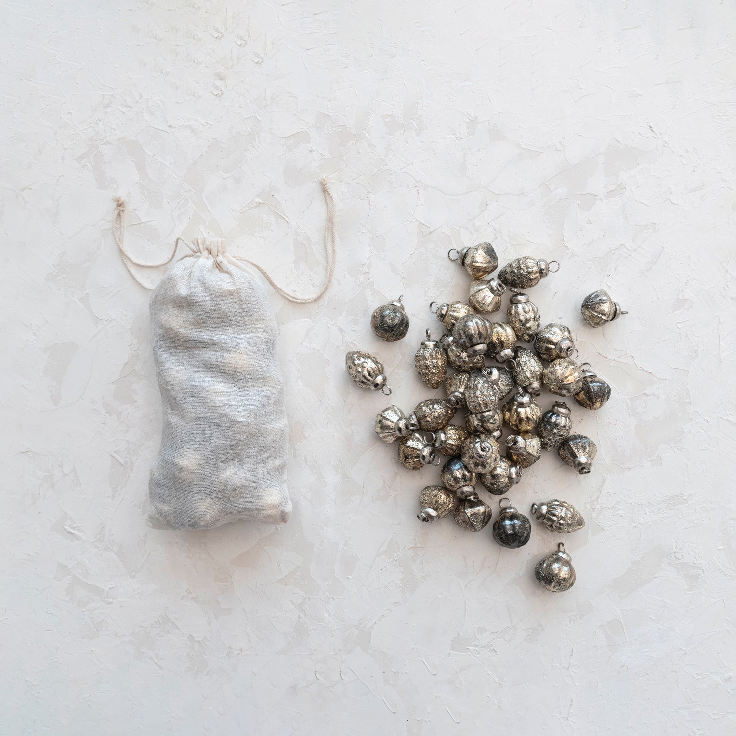Embossed Mercury Glass Ornaments, Set of 36 on a white background at Addison West