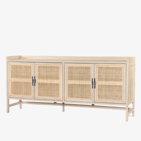 Four Hands Furniture brand caprice sideboard in light wood with four cane doors and iron handles on a white background