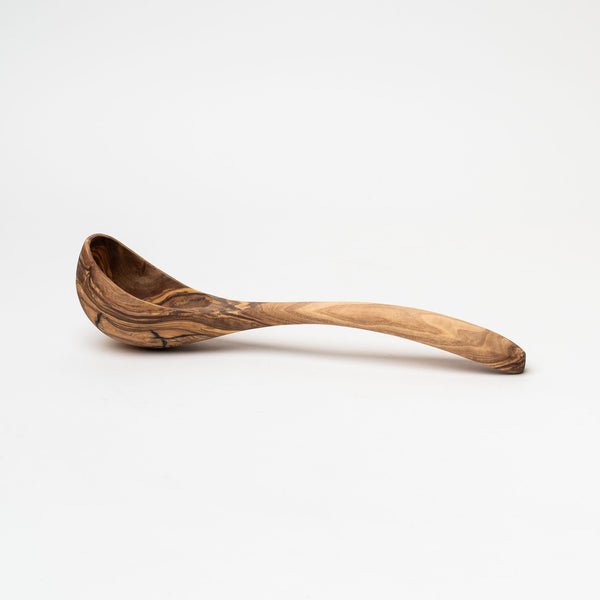 Olive wood ladle on a white background