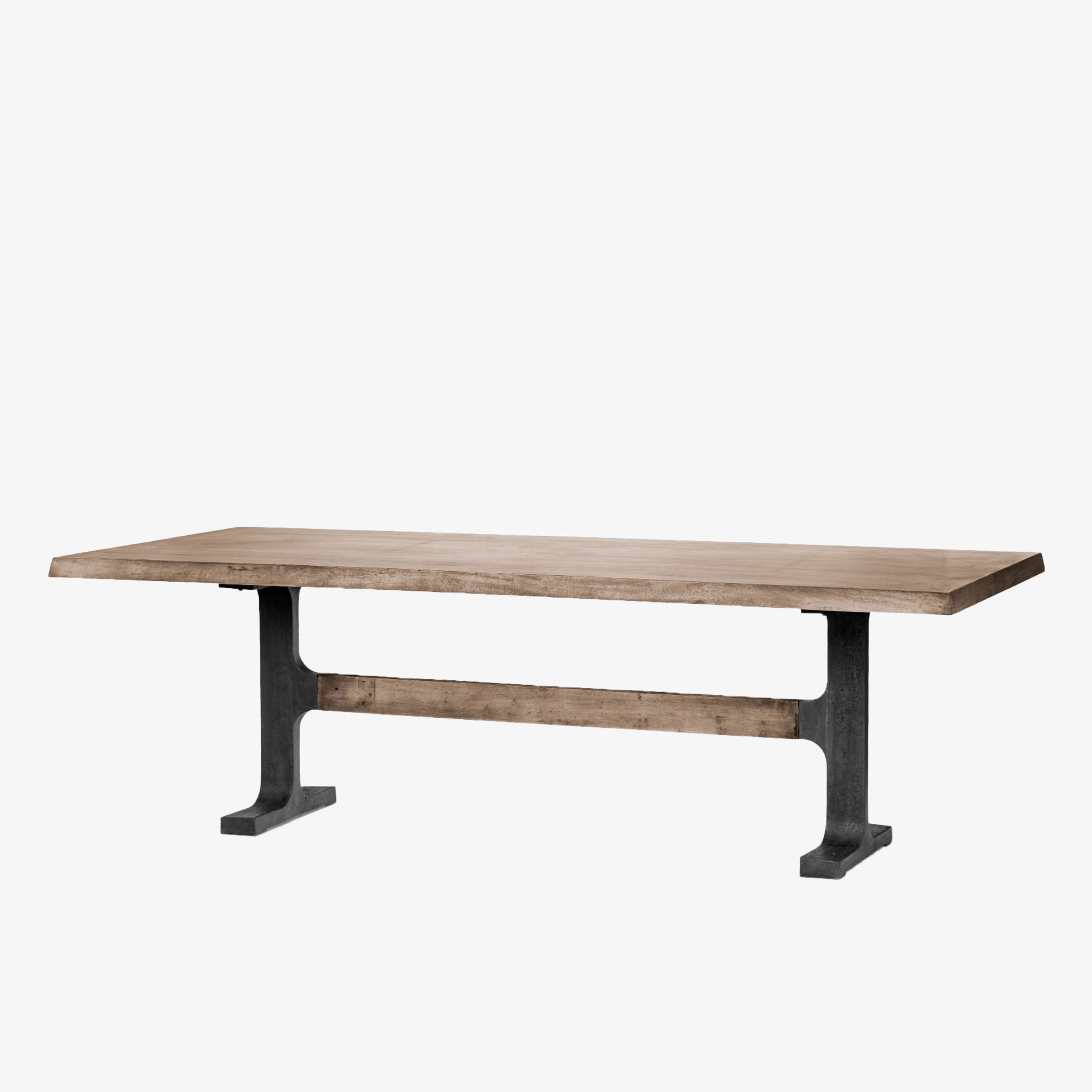 Large rectangular wood dining table with trestle style iron base on a white background
