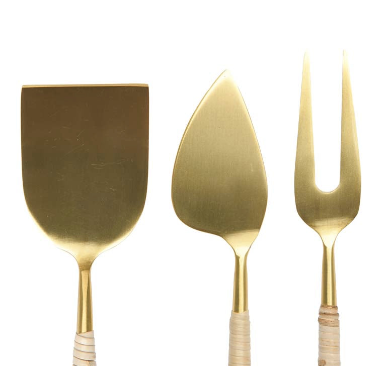 Gold finish set of 3 Stainless Steel Cheese Servers with Woven Rattan Handles on a white background