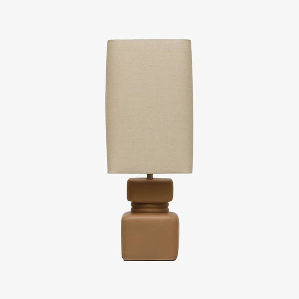 Square bloomingville terra-cotta colored table Lamp with square linen Shade on a white background