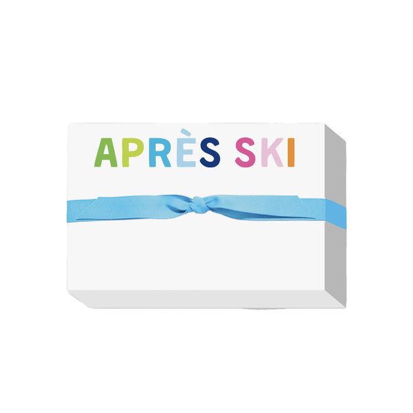 Thick notepad with 200 sheets that says Apres Ski in rainbow colors on a white background