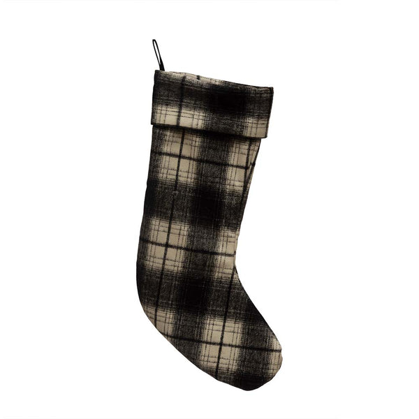 Black and white plaid stocking on a white background