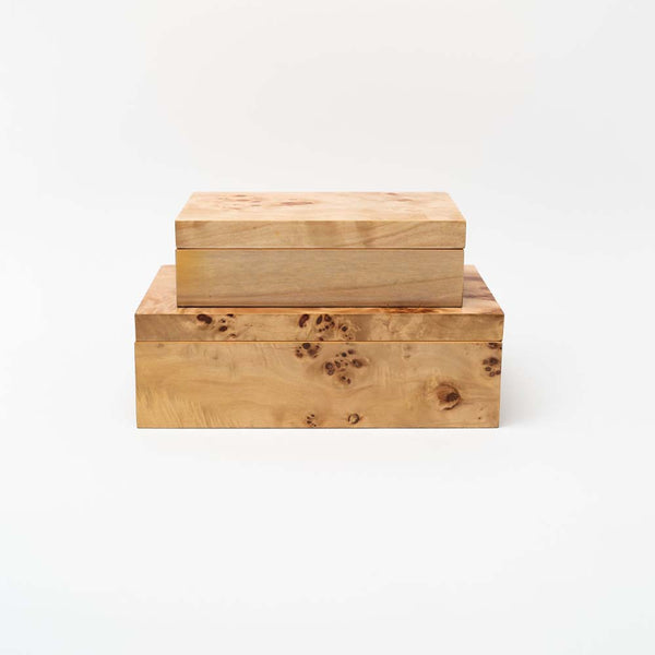 Set of two burl wood boxes stacked on top of each other on a white background