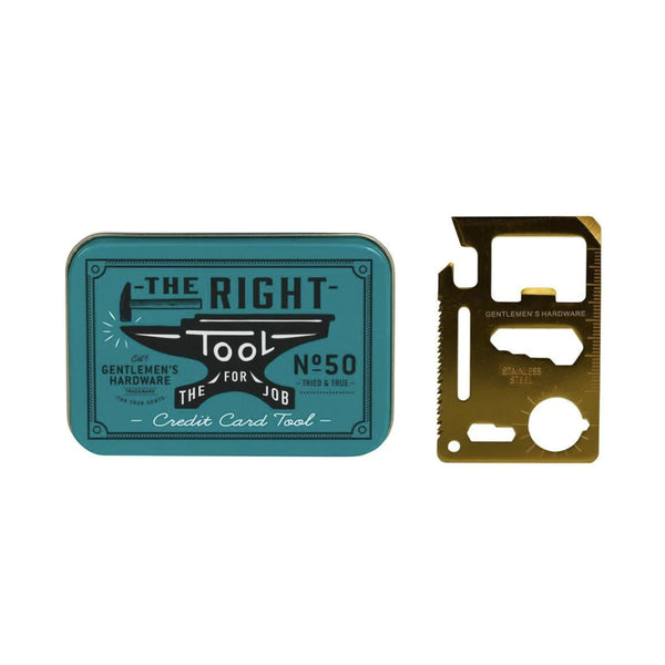 Gentleman's hardware brand brass toned credit card tool beside blue tin gift box