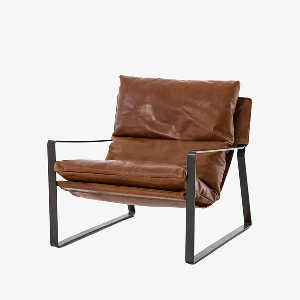 Tobacco brown leather 'Emmett' sling chair by Four hands furniture with iron frame