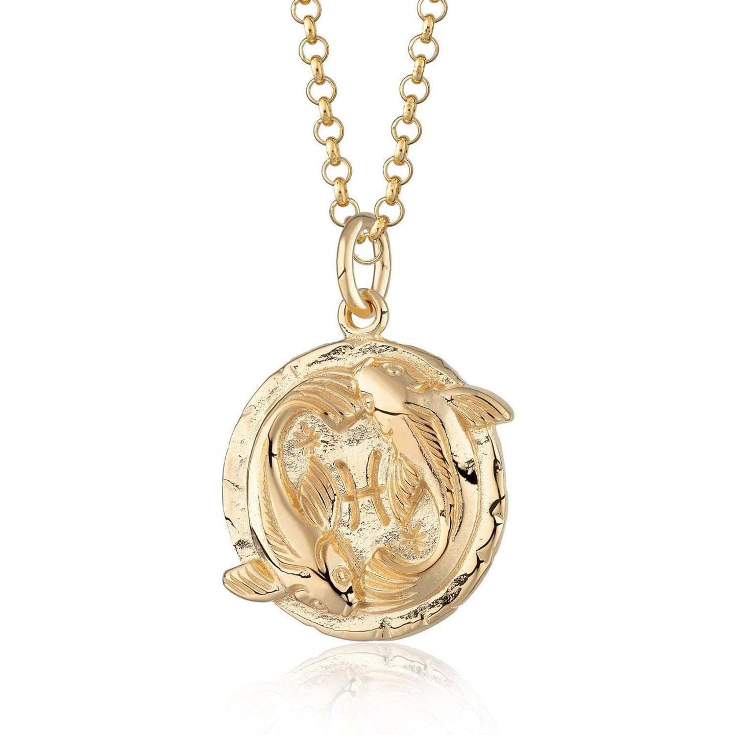 Scream Pretty brand gold Pisces zodiac star sign necklaces on a white background