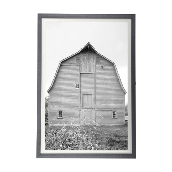Large black and white barn print in a wood frame on a white background