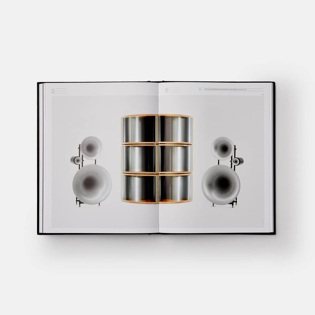 Inside pages of book titled 'Hi-Fi' with old recording equipment photo on a white background
