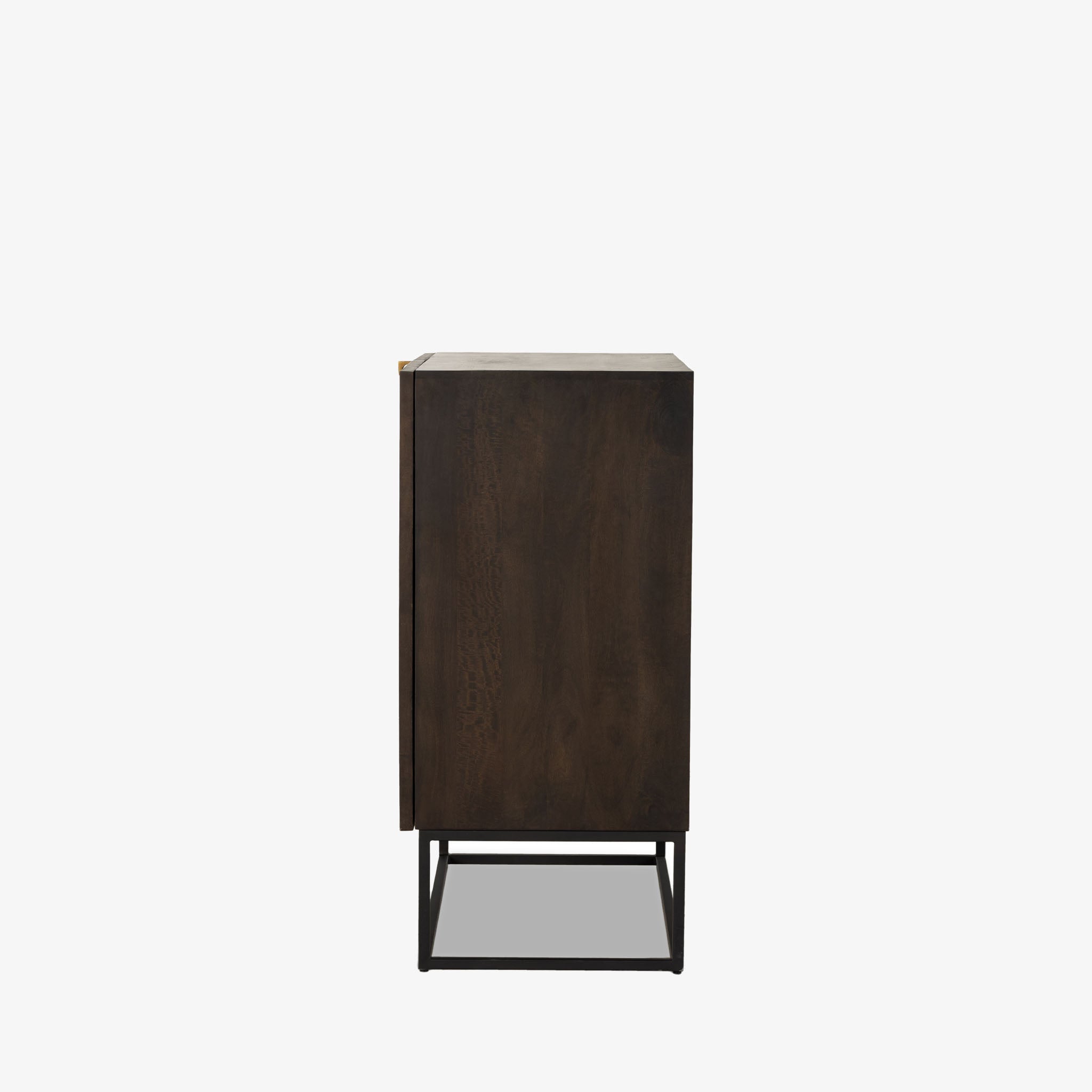 Kelby brown wood bar cabinet with carved doors and black iron frame base by four hands on a white background