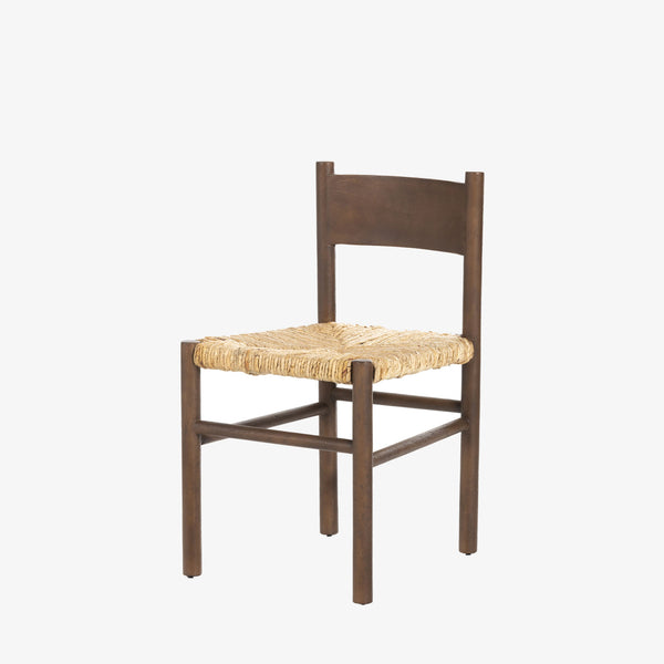 Close up of rush seat on wood 'Largo' dining chair in russet mango by four hands furniture on a white background