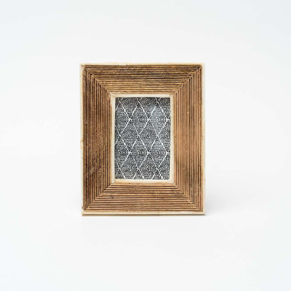 Mango wood picture frame with cream border on a white background 