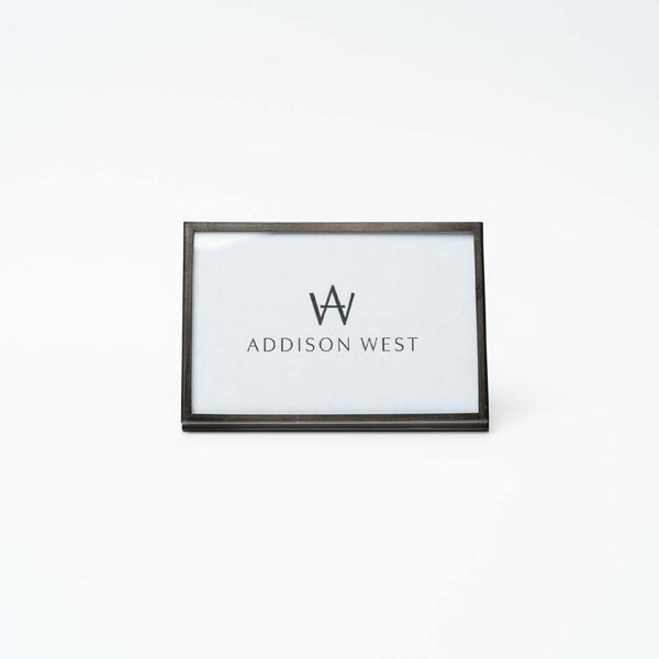 Metal easel style 4x6 picture frame on a white background