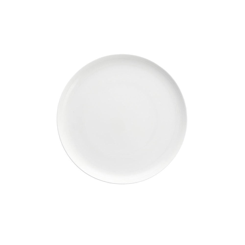 White coupe ten and a half inch dinner plate by fortessa on a whit ebackground