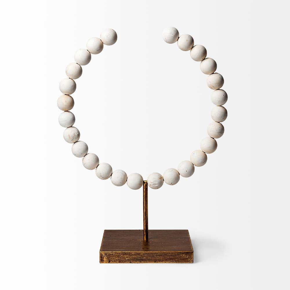 White Beaded Broken Sphere Decorative Object with Gold Base on a white background front view