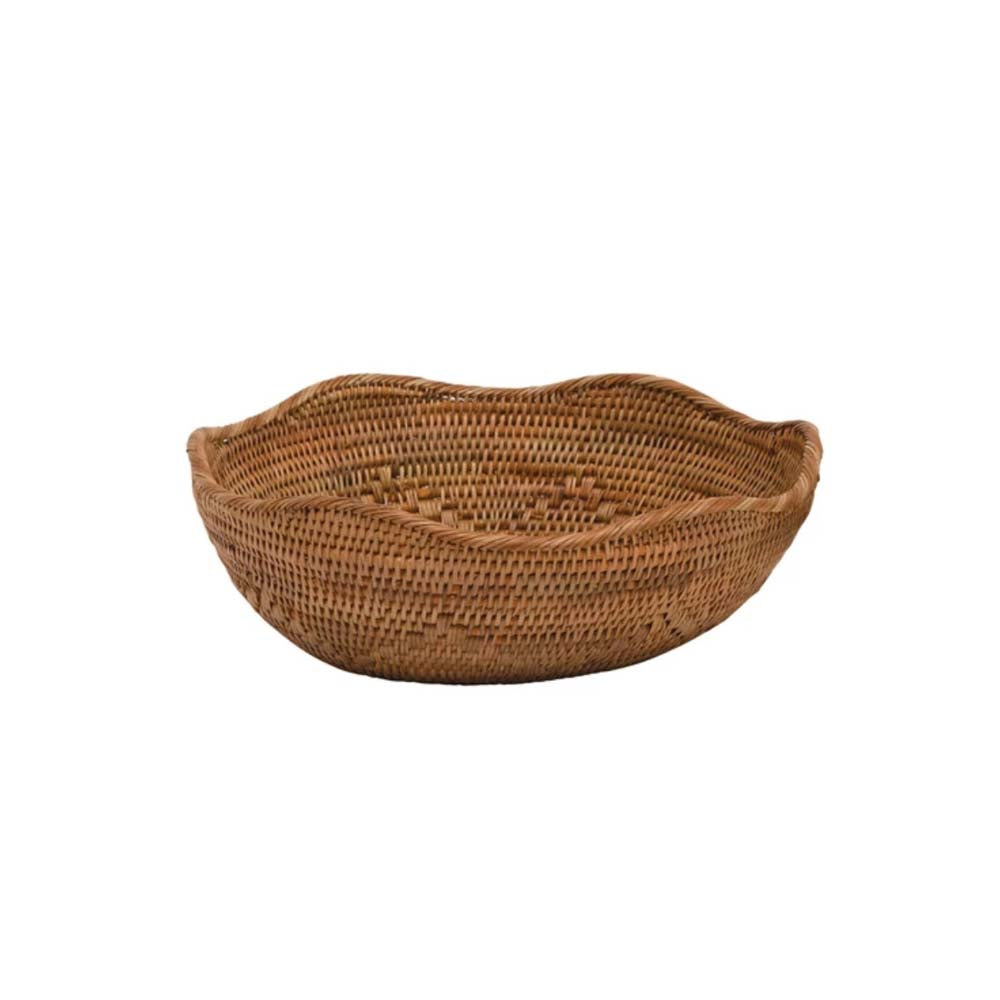 Large hand woven rattan nesting bowls with wavy lip by Bloomingville