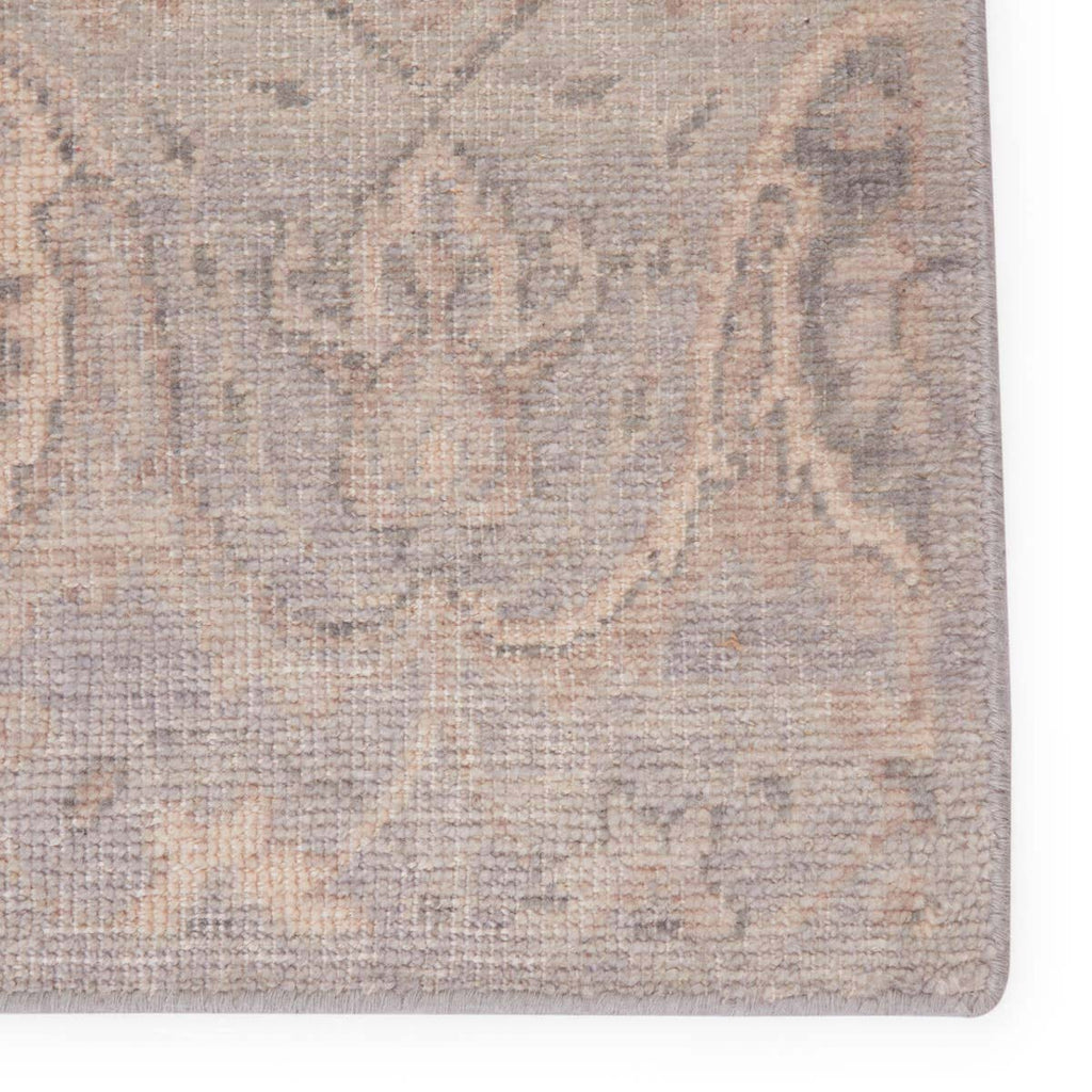 Close up of Jaipur living REVOLUTION - REL11 rug in neutral beige and gray tones on a white background  Edit alt text
