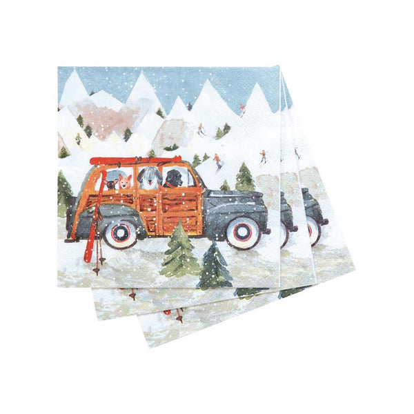 Ski Day Cocktail Napkins with wood panelled truck and dogs and mountains in the background on a white background