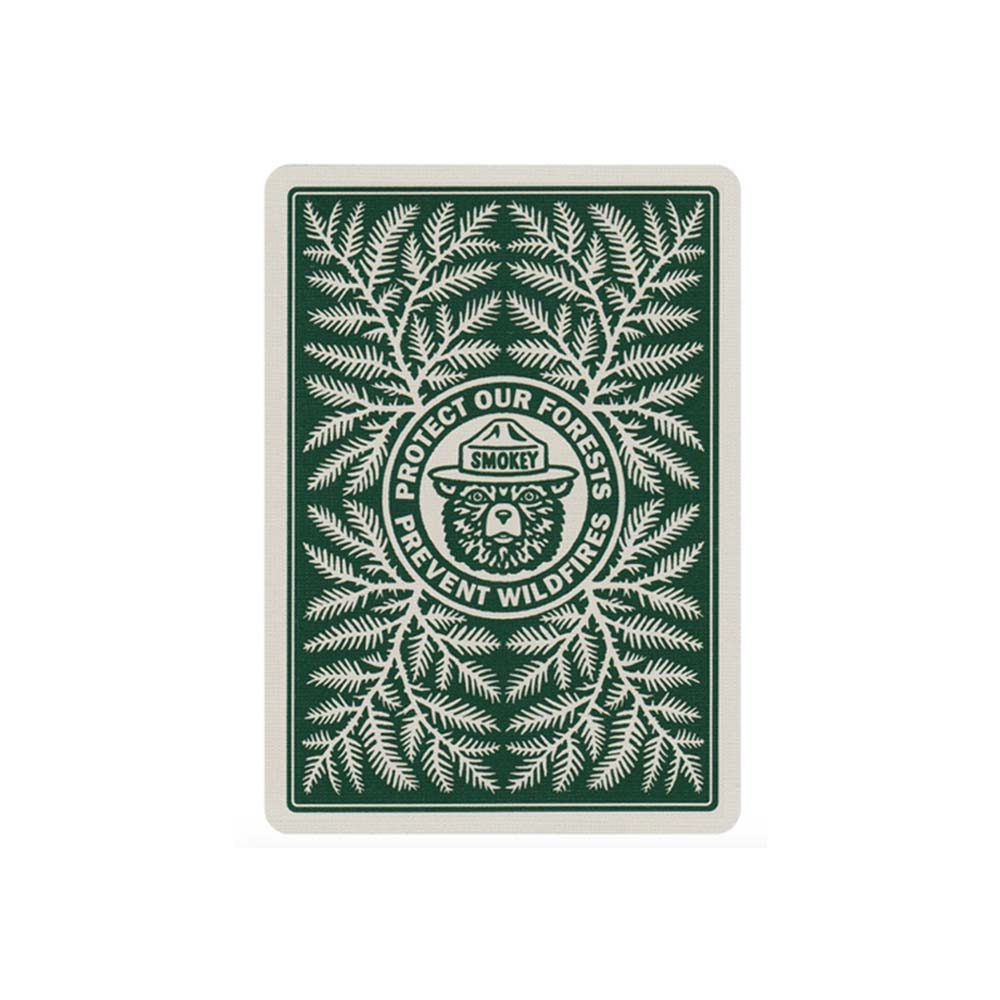 Art of Play brand Smokey Bear green and white playing card with 'protect our forrests' on a white background