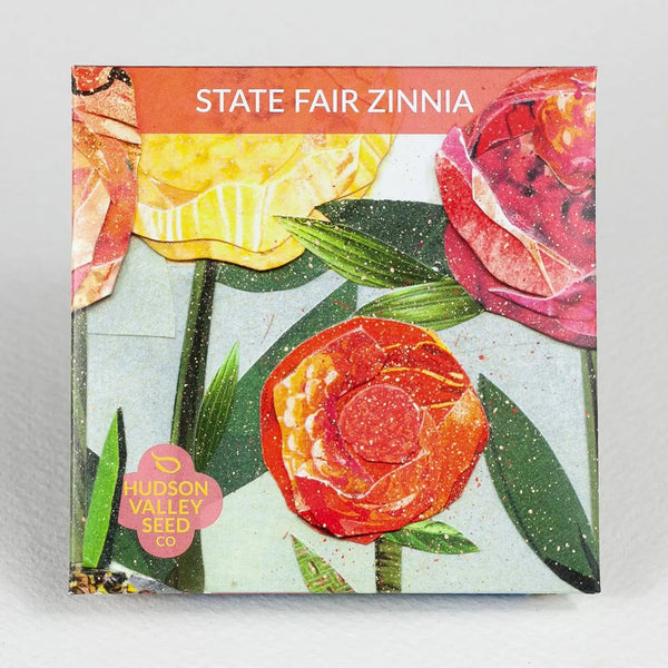 Hudson Valley Seed company state fair zinnia seed pack with colorful zinnia art on a grey background