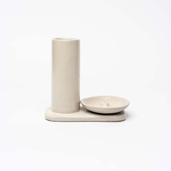 White stoneware incense holder with burning dish on a white background