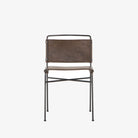Four hands brand wharton chair with black iron frame and dark brown leather seat on a white background