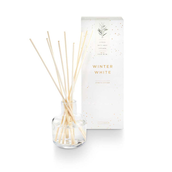 Illume winter white glass and reed diffuser and box on a white background