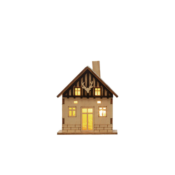 Laser cut LED light up wood cabin on a white background