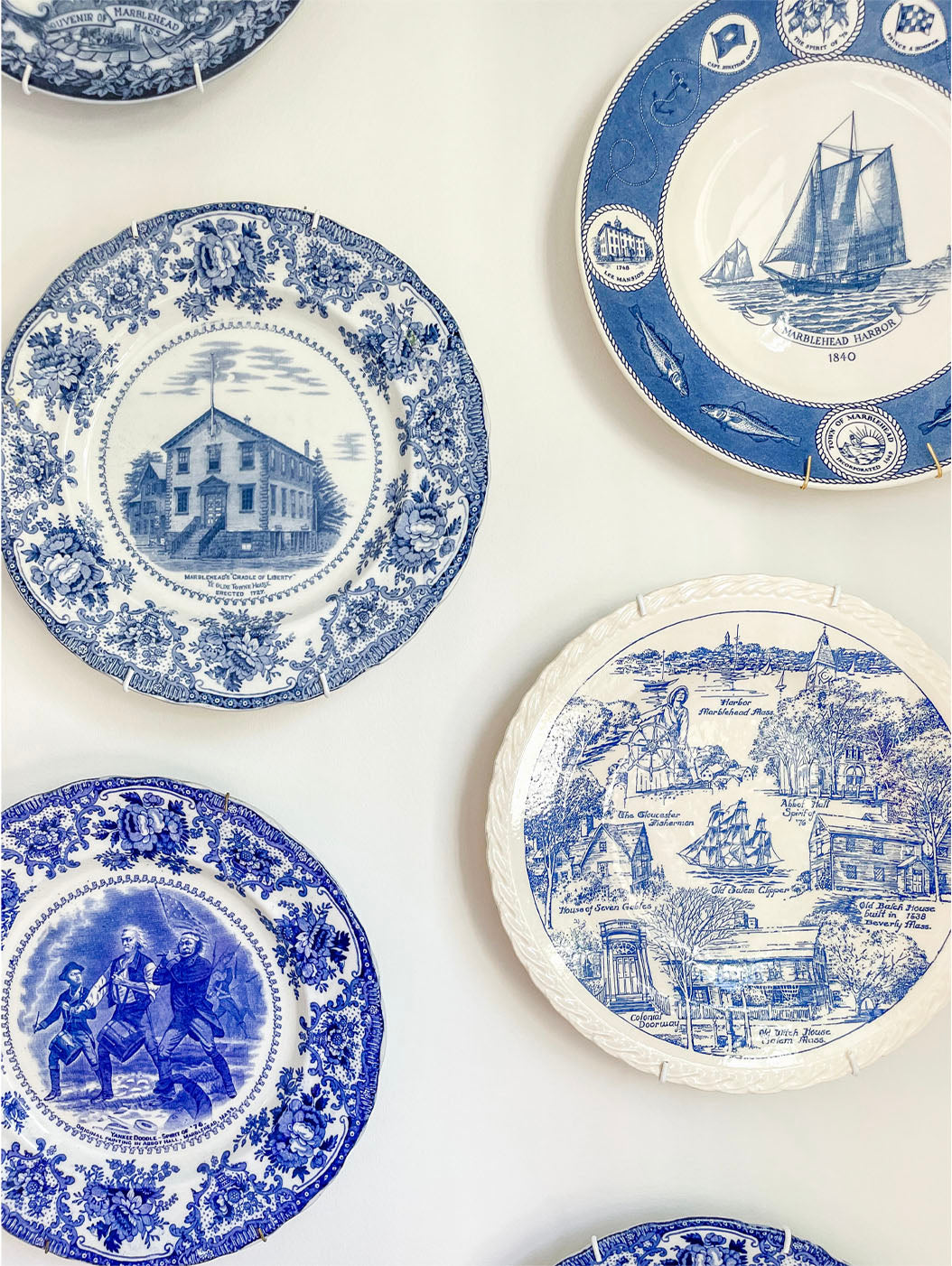 Wood bowl filled with green and glass insulators