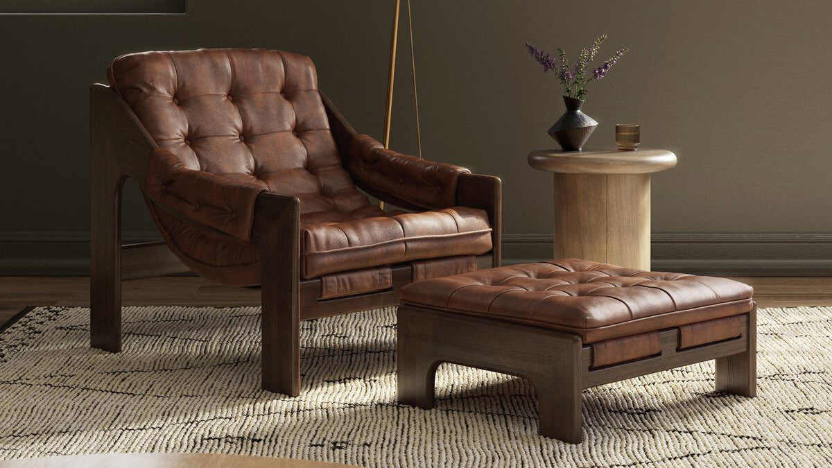 Four Hands furniture, Halston leather arm chair and leather ottoman in a living room at Addison West