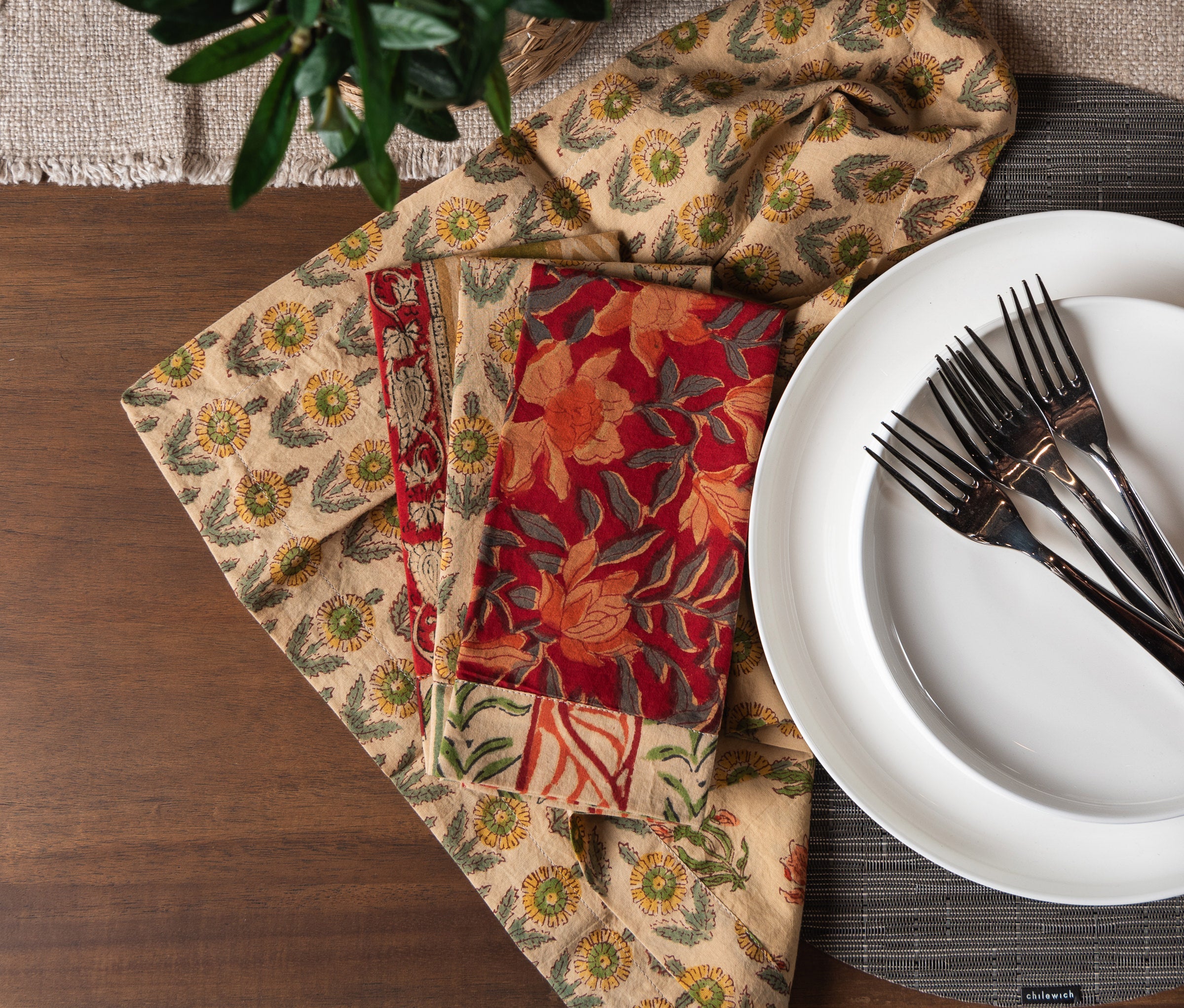 Handmade napkins exclusive to Addison West on a dining table