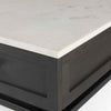 Square end table with black iron base, wood shelf and drawer and marble top on a white background
