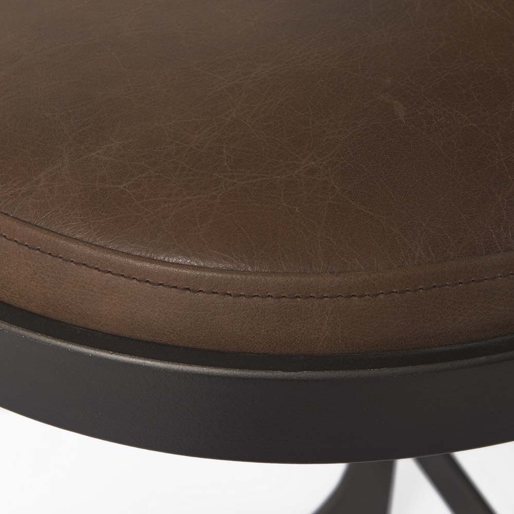 Black bar stool with iron base and U-shaped leather seat on a white background