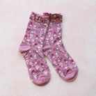 Garden Flower Socks in Pink on a pink background at Addison West