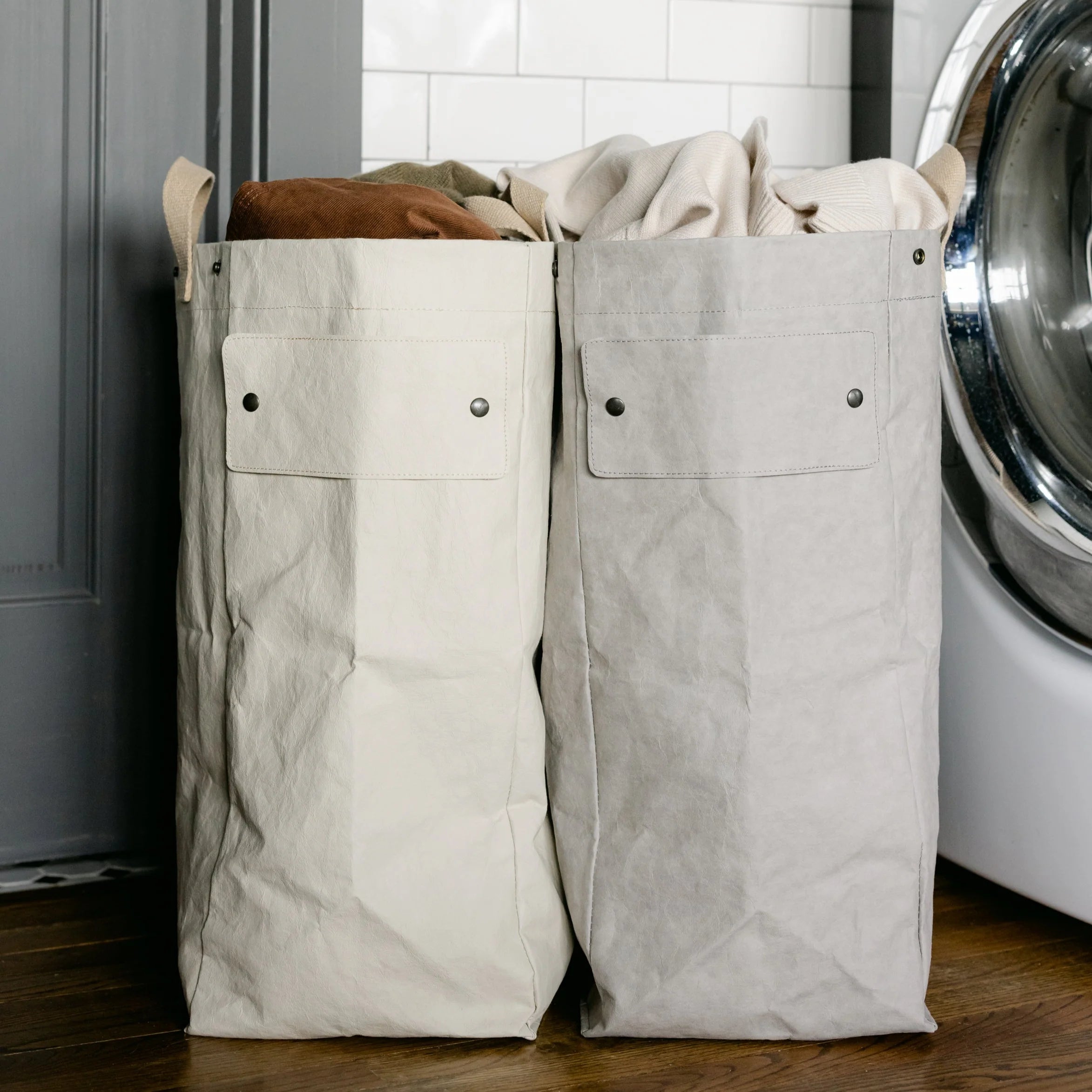 Uashmama Laundry Hamper Bag in a laundry room at Addison West