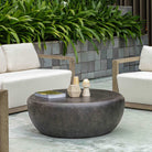 Joss Indoor–Outdoor Coffee Table on a patio at Addison West