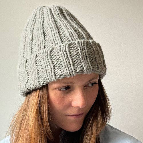 Knitting Craft Kit: Shoreline Beanie in Pebbled Beach on a beige background at Addison West