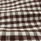 Tobacco Gingham Check Linen Tablecloth, 60" x 90" on a table at Addison West