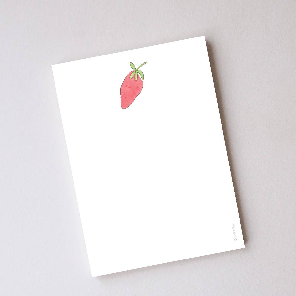 Strawberry Notepad on a white background at Addison West