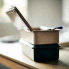 Toyo Steel Stackable Storage Box T-190 in Military Green on a table at Addison West