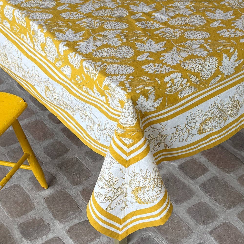 Fallscape Tablecloth, 60" x 120" on a table at Addison West