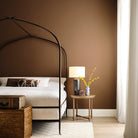 Caldera Lamp Table in Vintage Finish in a bedroom at Addison West